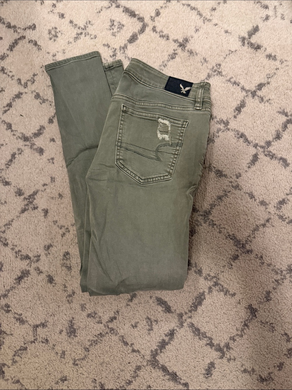 American Eagle Outfitters Olive Skinny Jeans with Back Pocket Distress